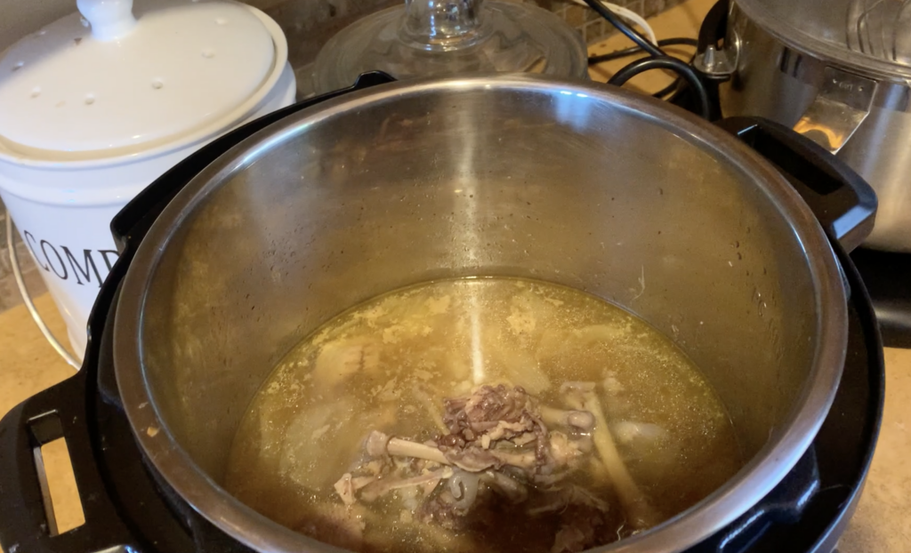 instant pot with bones and juices