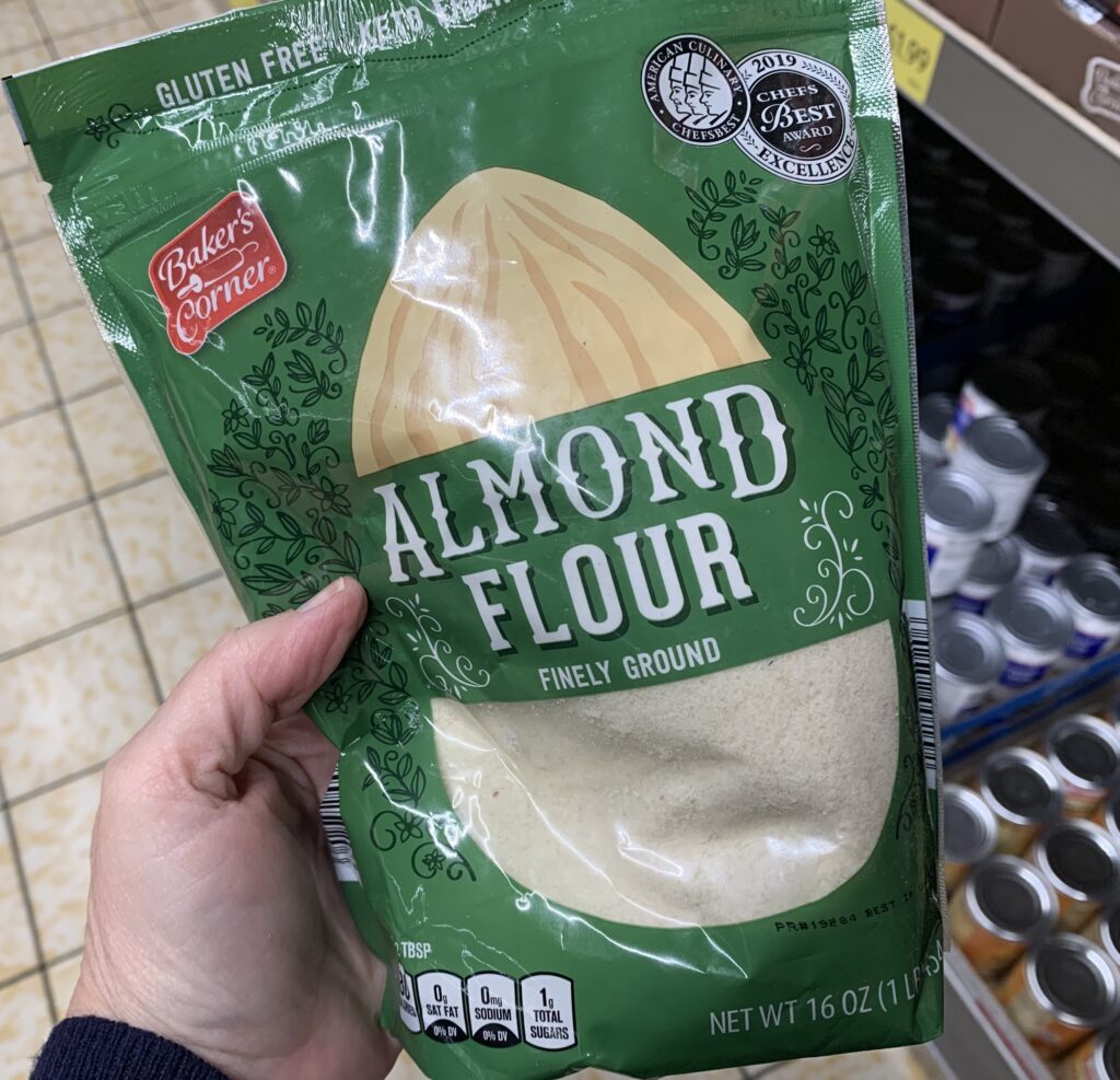 bag of almond flour held in hand